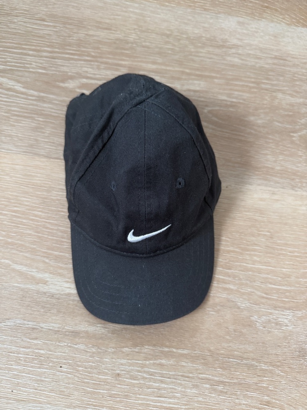 Nike Black Cap with White Swoosh Logo
